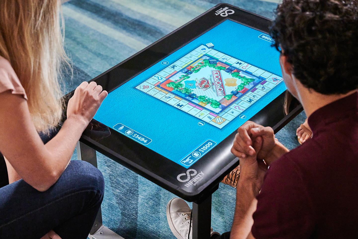 Touchscreen table packs dozens of digital board games and puzzles post thumbnail image