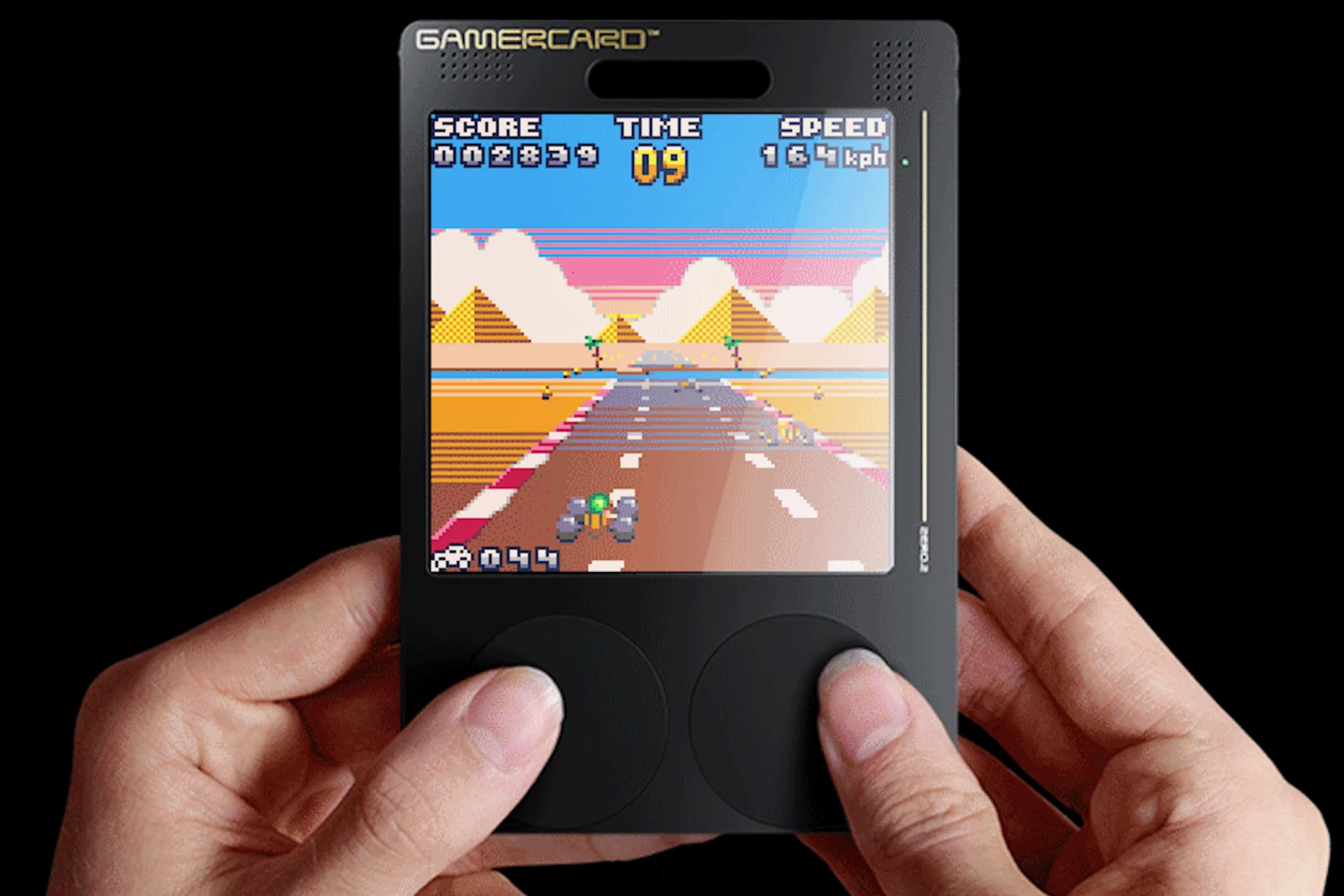 Handheld gaming console takes the form of a pocketable card post thumbnail image